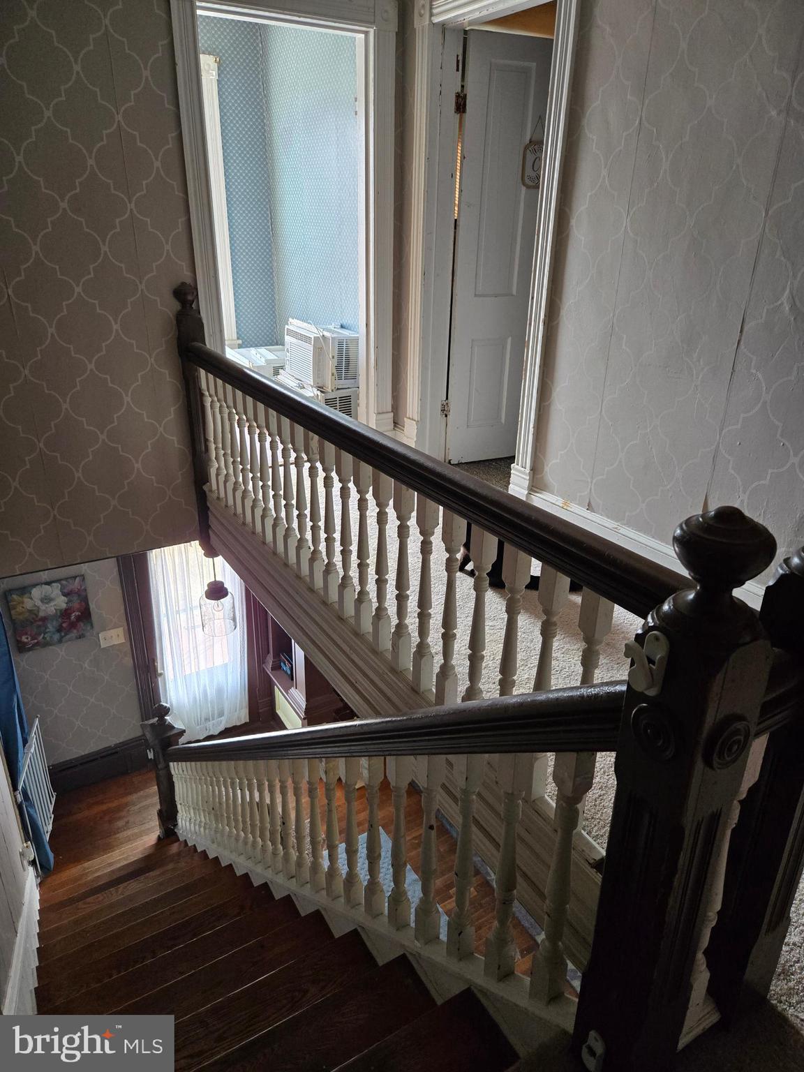 126 Maple Avenue Preston, MD 21655 - Photo 21 of 22 a view of staircase with railing and a window