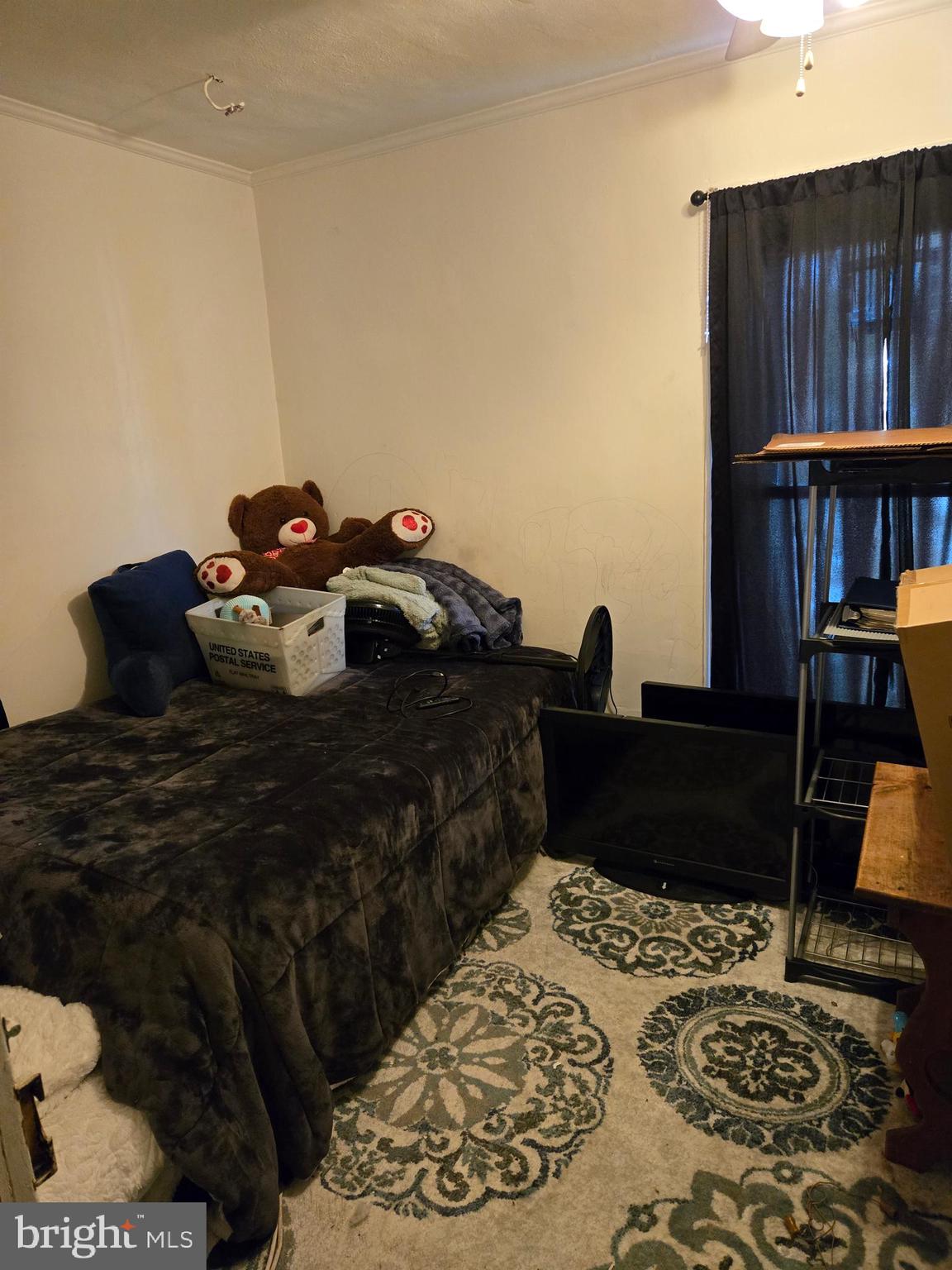 126 Maple Avenue Preston, MD 21655 - Photo 10 of 22 a bed room with a bed and a book shelf