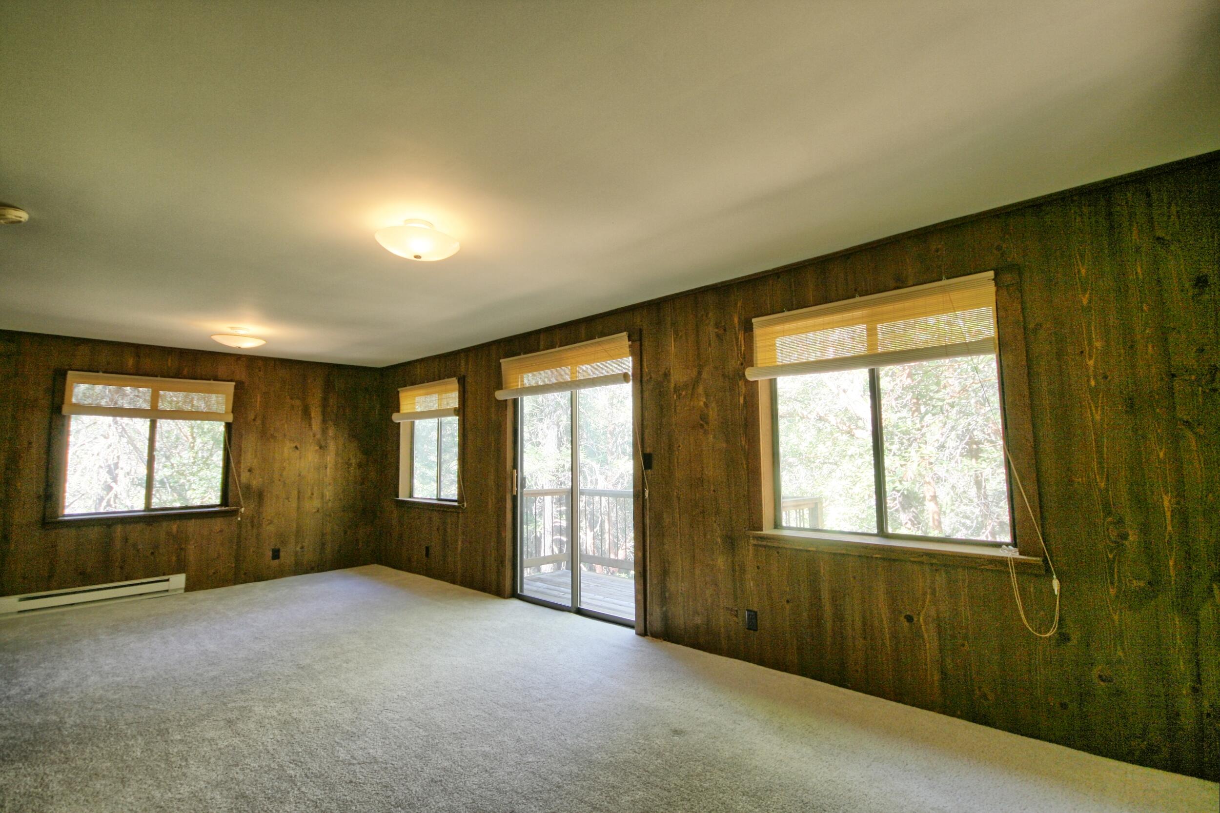 939 Beaver Creek Road Jacksonville, OR 97530 - Photo 24 of 53 plenty of windows in master