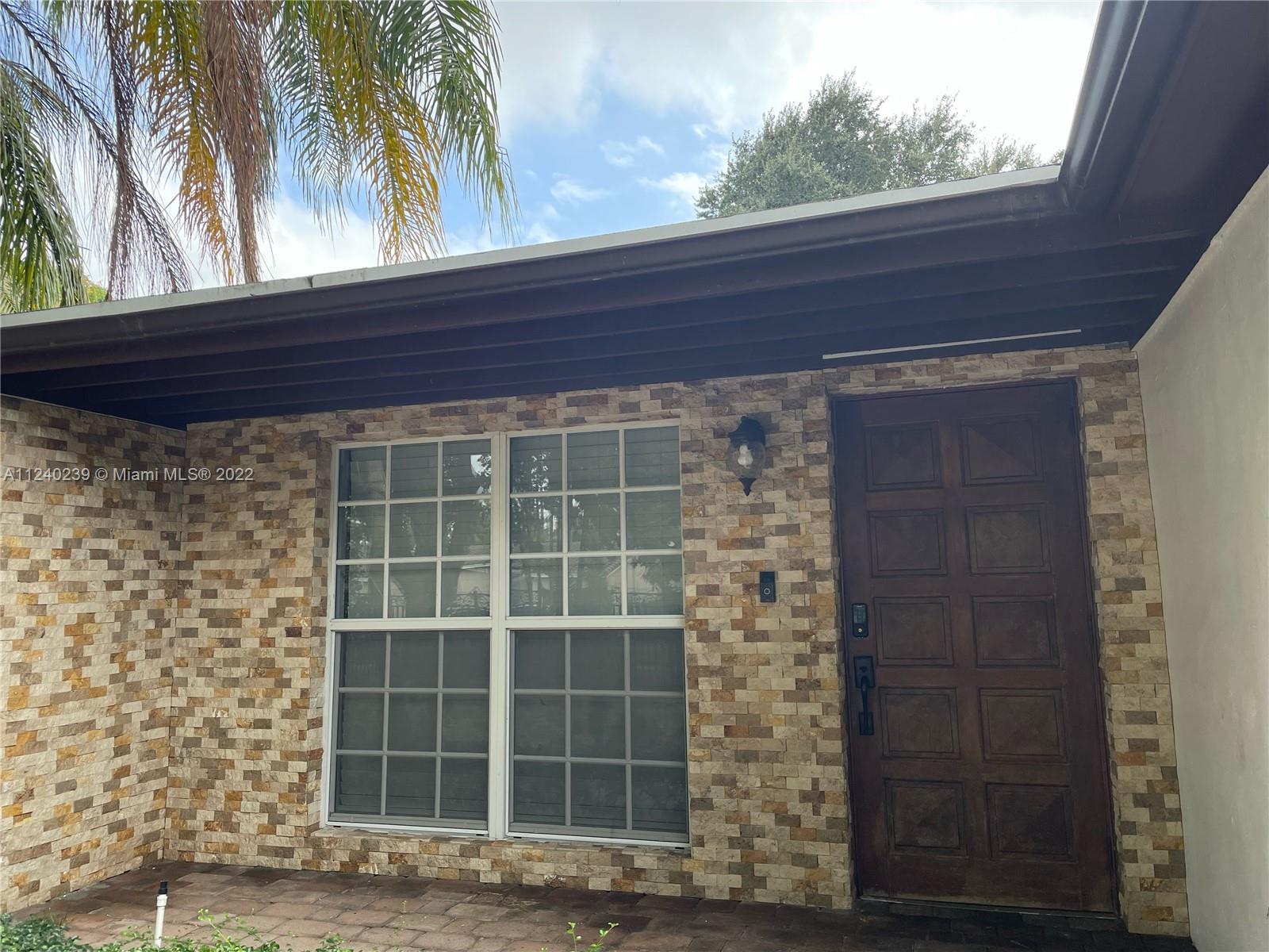 4220 Southwest 13th Street, Unit 4220 Miami, FL 33134 - Photo 3 of 14 a front view of a house