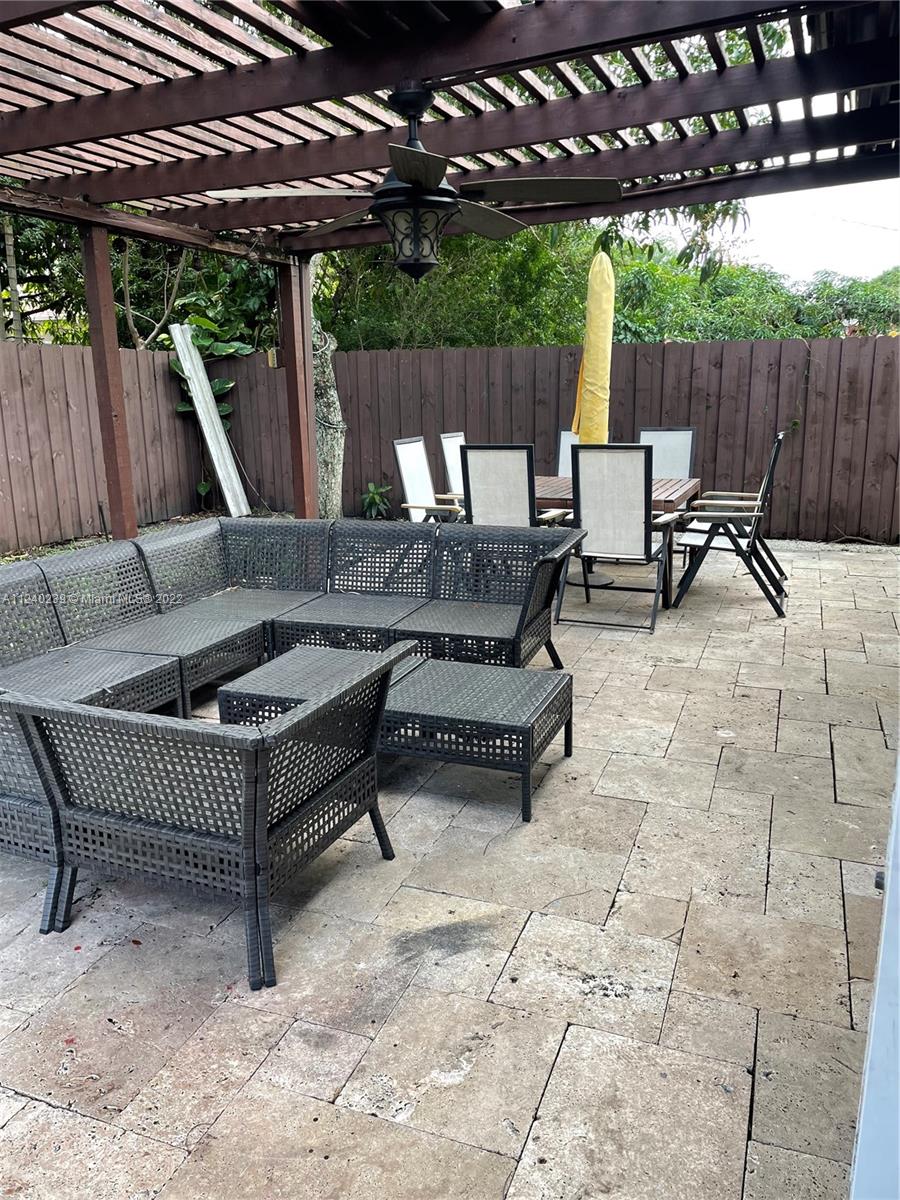4220 Southwest 13th Street, Unit 4220 Miami, FL 33134 - Photo 6 of 14 a patio view with patio furniture