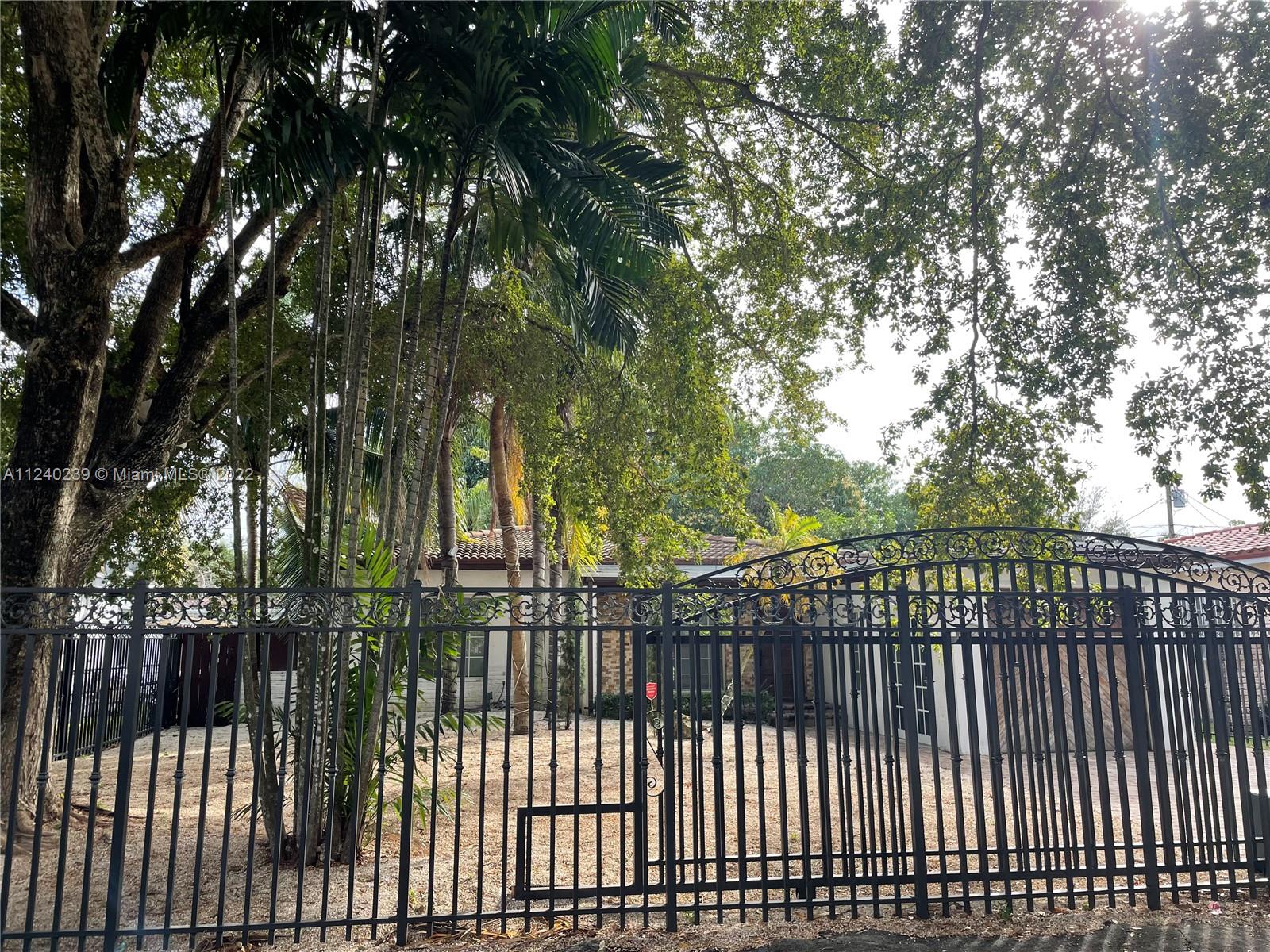 4220 Southwest 13th Street, Unit 4220 Miami, FL 33134 - Photo 8 of 14 a view of a wrought iron fences