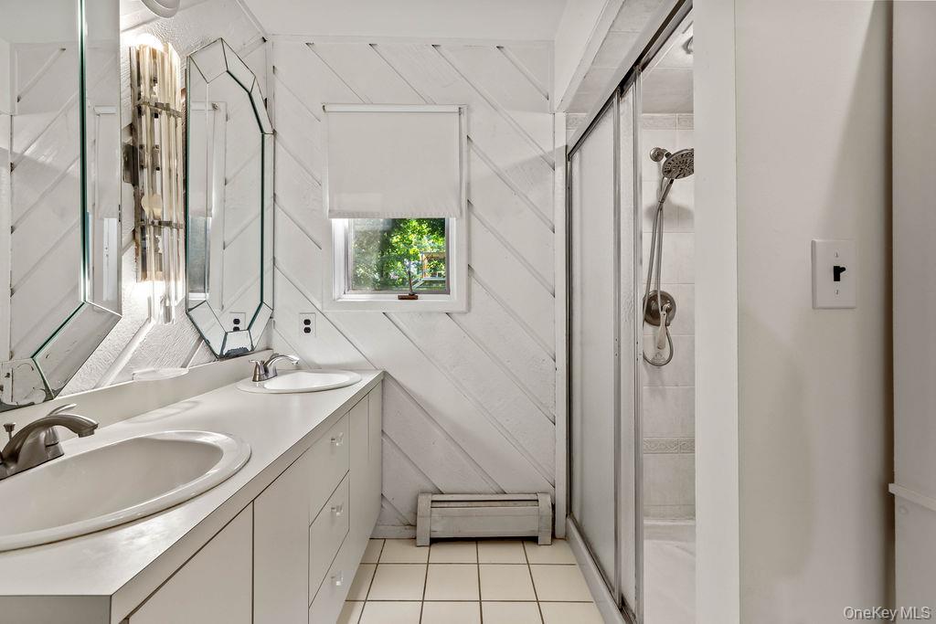 11 Buena Vista Road Suffern, NY 10901 - Photo 30 of 45 Primary Full Bathroom with Shower and double vanity.