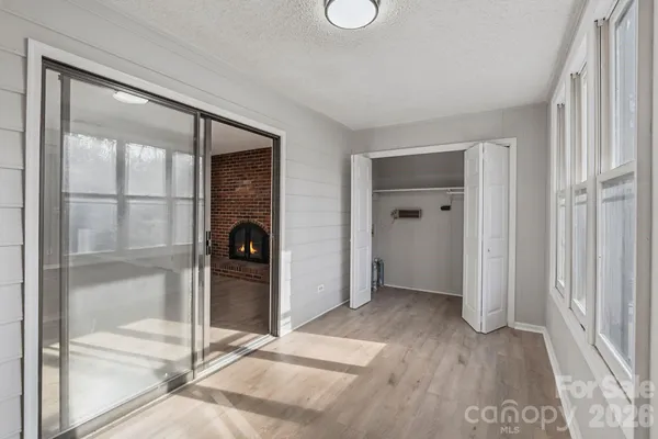 a view of entryway with wooden floor