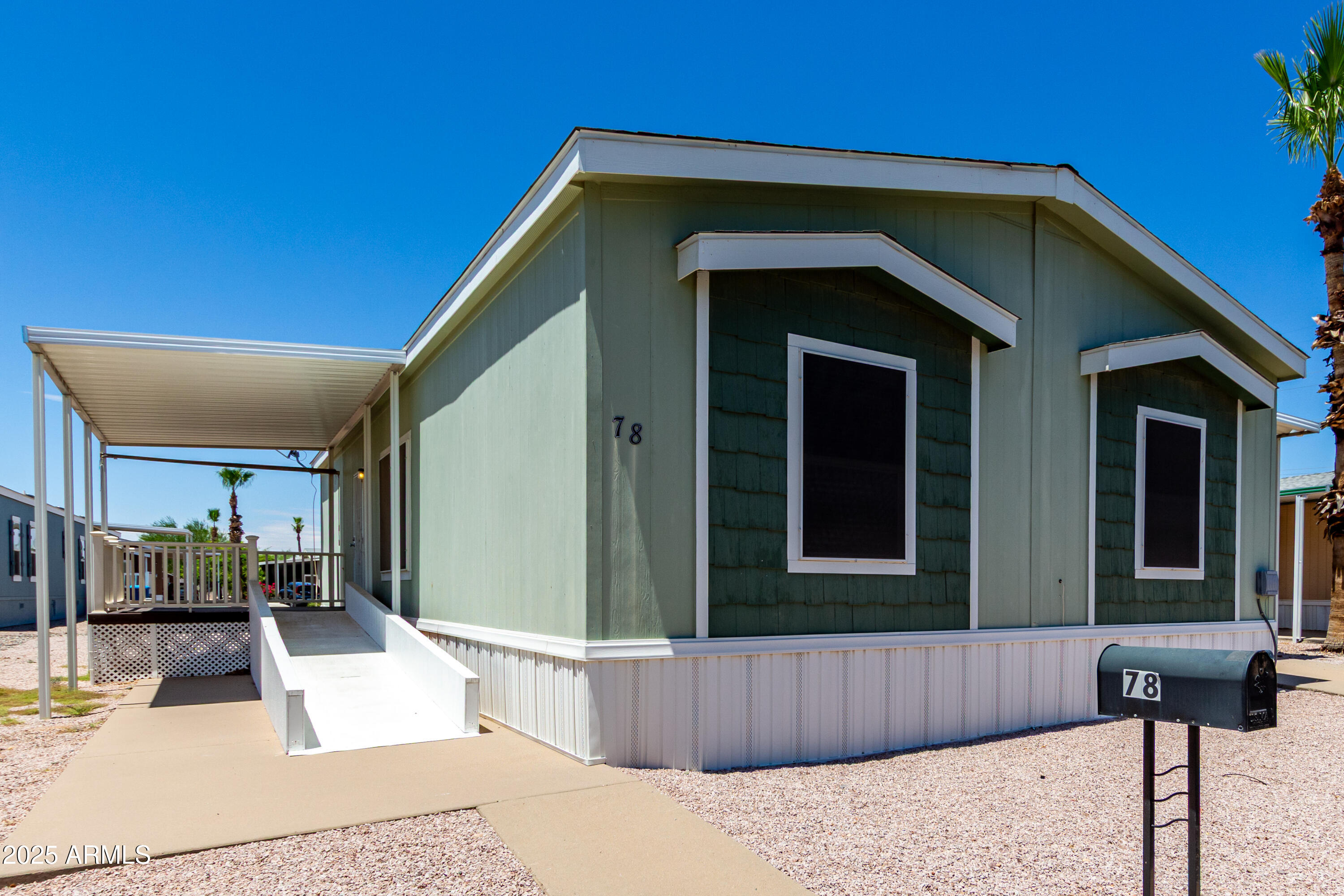 a front view of a house with parking