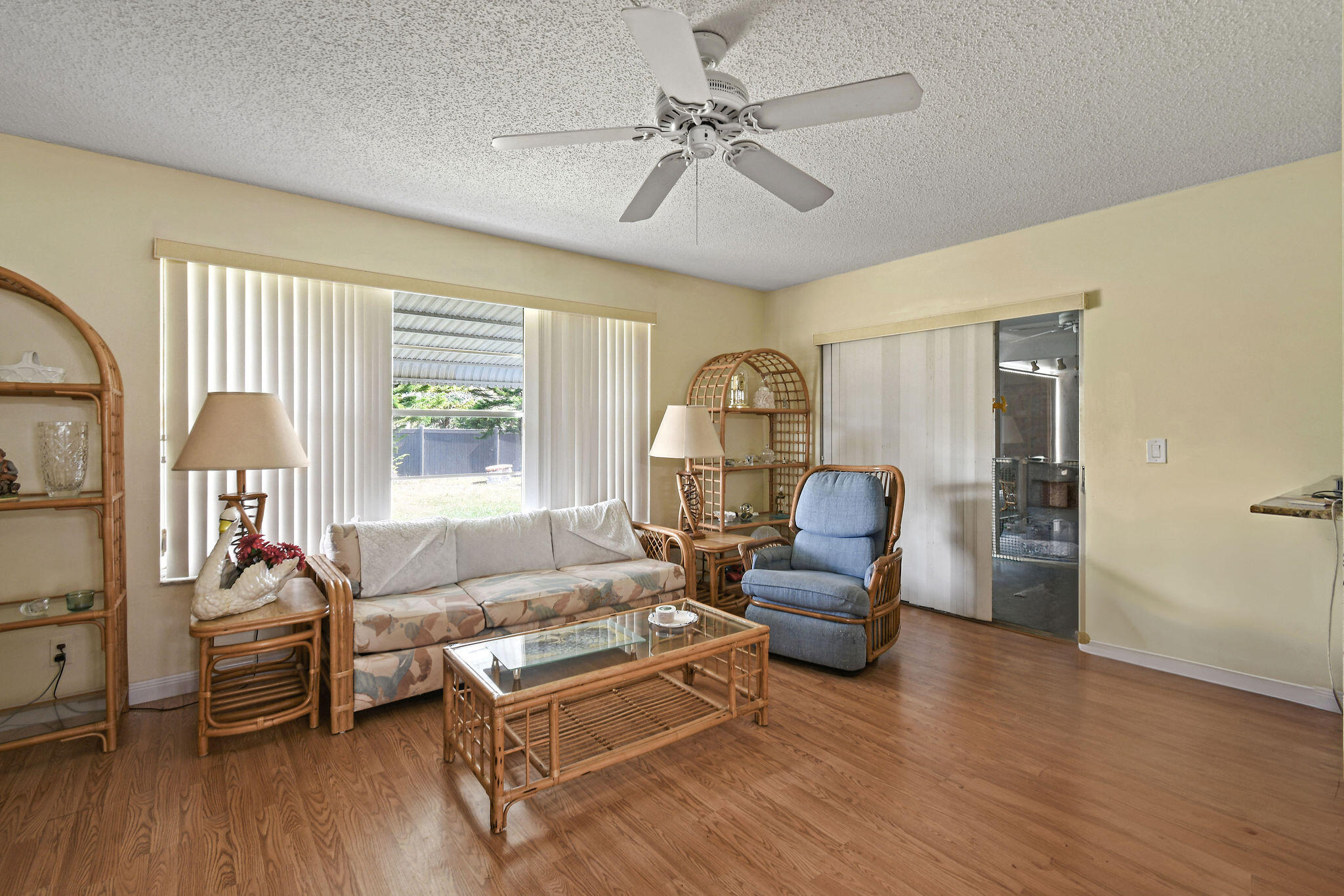 160 Banyan Circle Jupiter, FL 33458 - Photo 25 of 62 a living room with furniture and a wooden floor