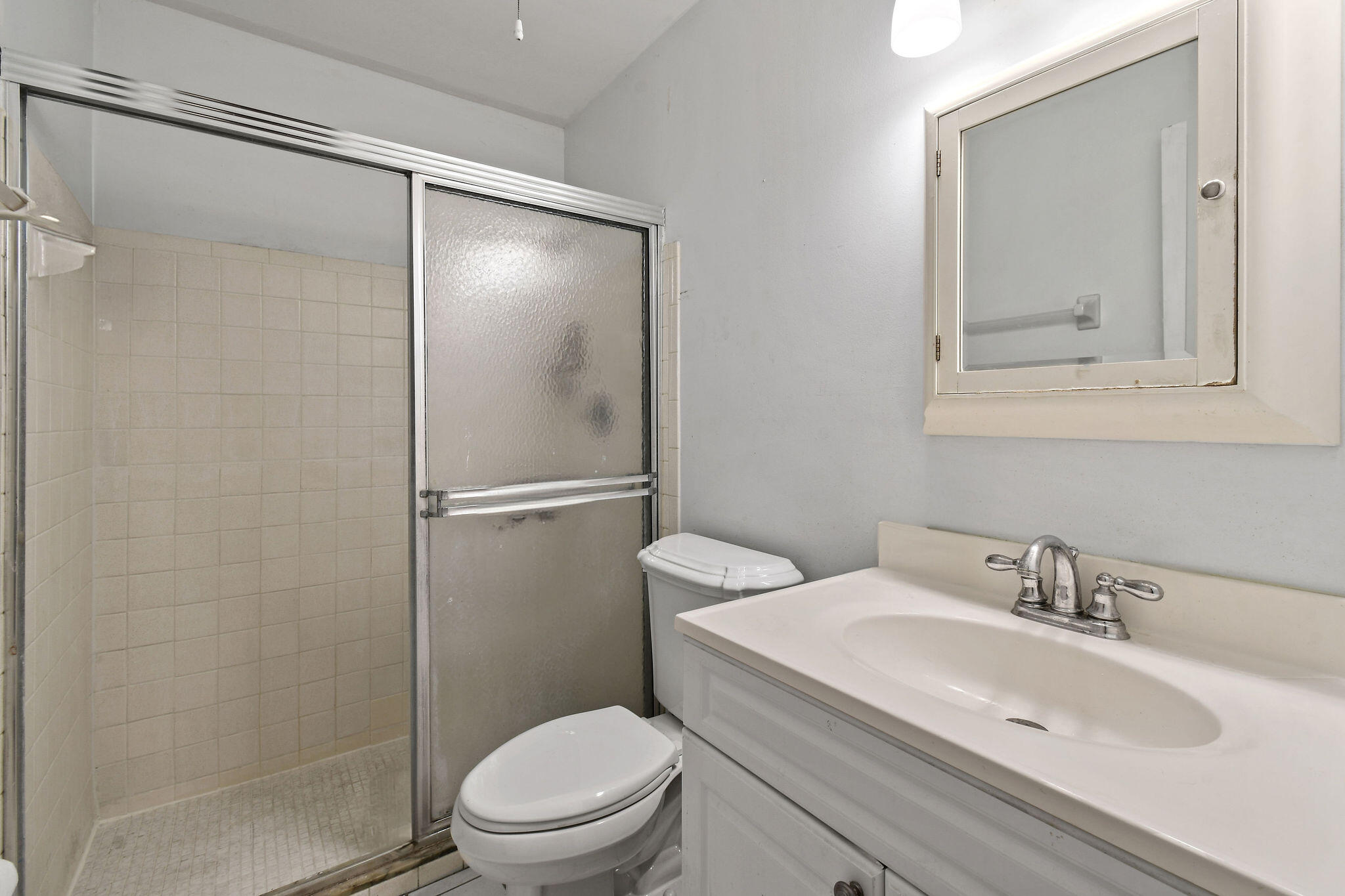 160 Banyan Circle Jupiter, FL 33458 - Photo 33 of 62 a bathroom with a sink toilet and shower