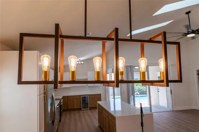 a view of a living room with furniture and window