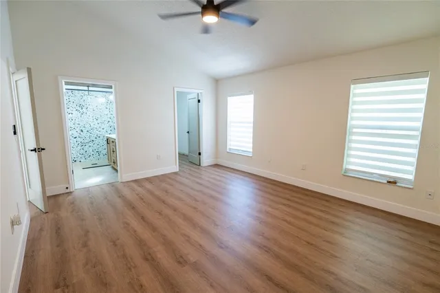 a bathroom with a bathtub and shower
