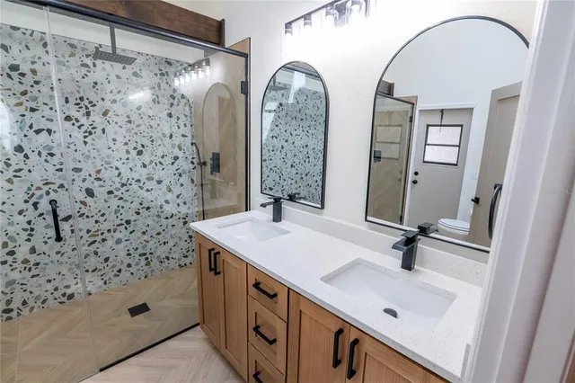 a bathroom with a bathtub and a shower
