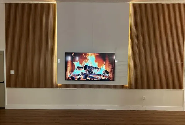 a room with furniture and wooden floor