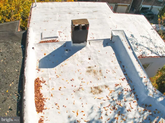 a view of balcony with wooden floor