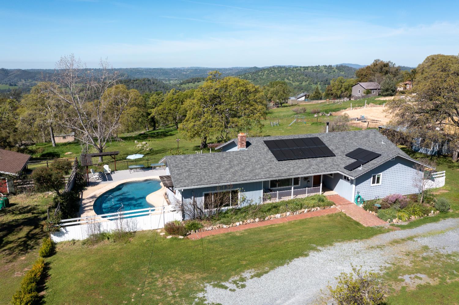 6980 Crystal Boulevard El Dorado, CA 95623 - Photo 15 of 49 an aerial view of residential houses with outdoor space and swimming pool