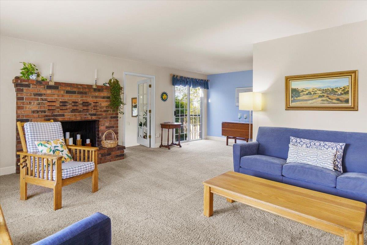 6980 Crystal Boulevard El Dorado, CA 95623 - Photo 32 of 49 a living room with furniture and a fireplace