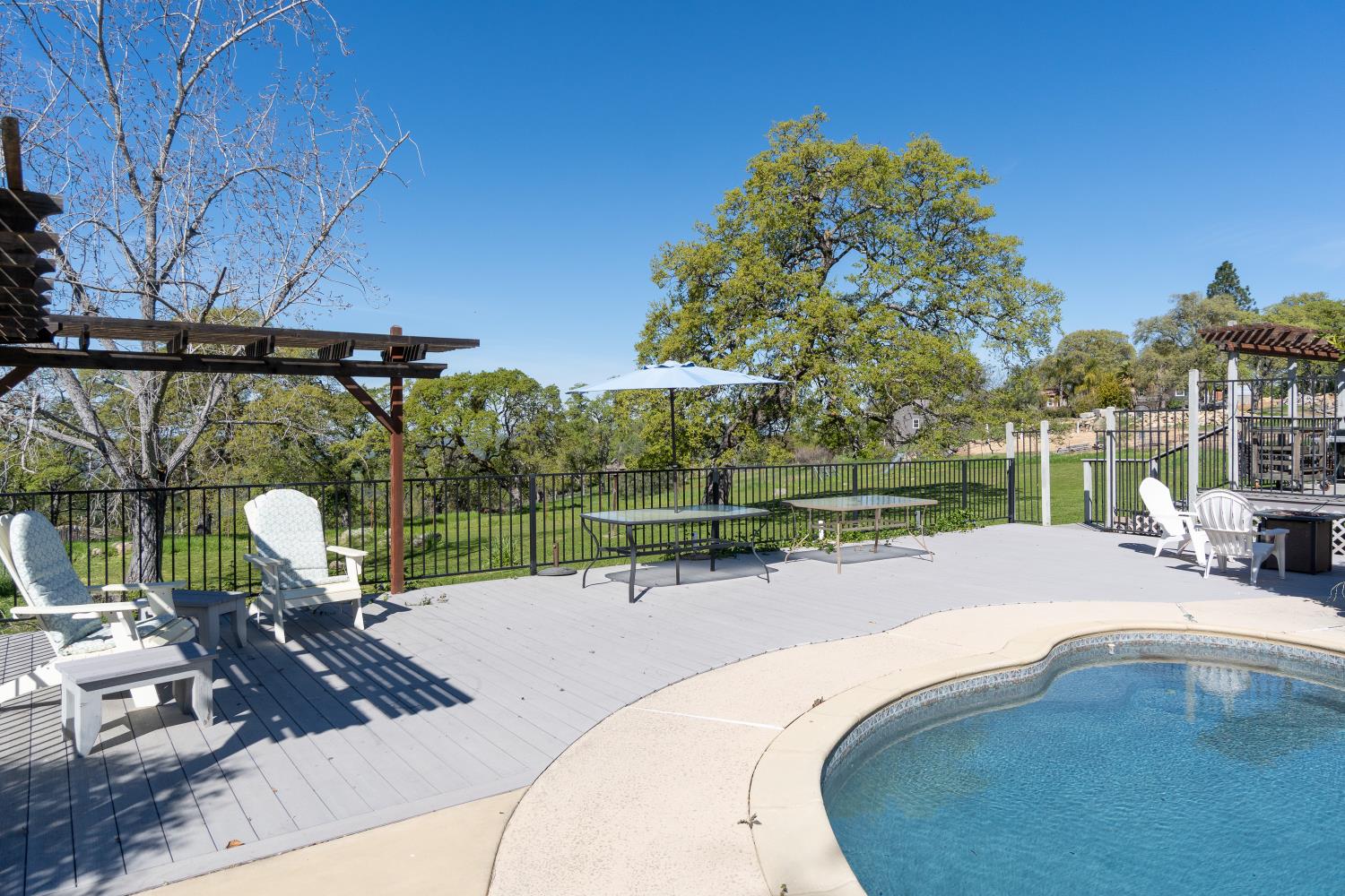 6980 Crystal Boulevard El Dorado, CA 95623 - Photo 4 of 49 a view of a swimming pool with a patio