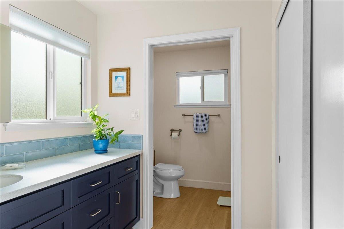 6980 Crystal Boulevard El Dorado, CA 95623 - Photo 47 of 49 a bathroom with a granite countertop sink a toilet and shower