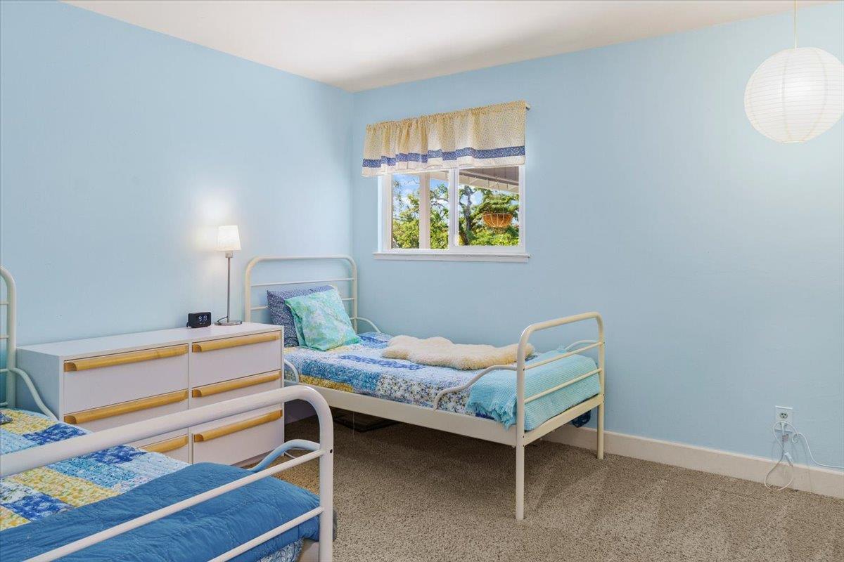 6980 Crystal Boulevard El Dorado, CA 95623 - Photo 48 of 49 a bedroom with a bed and a window