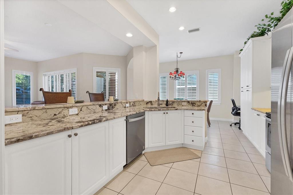 5425 46th Court West Bradenton, FL 34210 - Photo 12 of 39 a bathroom with a granite countertop sink mirror and a