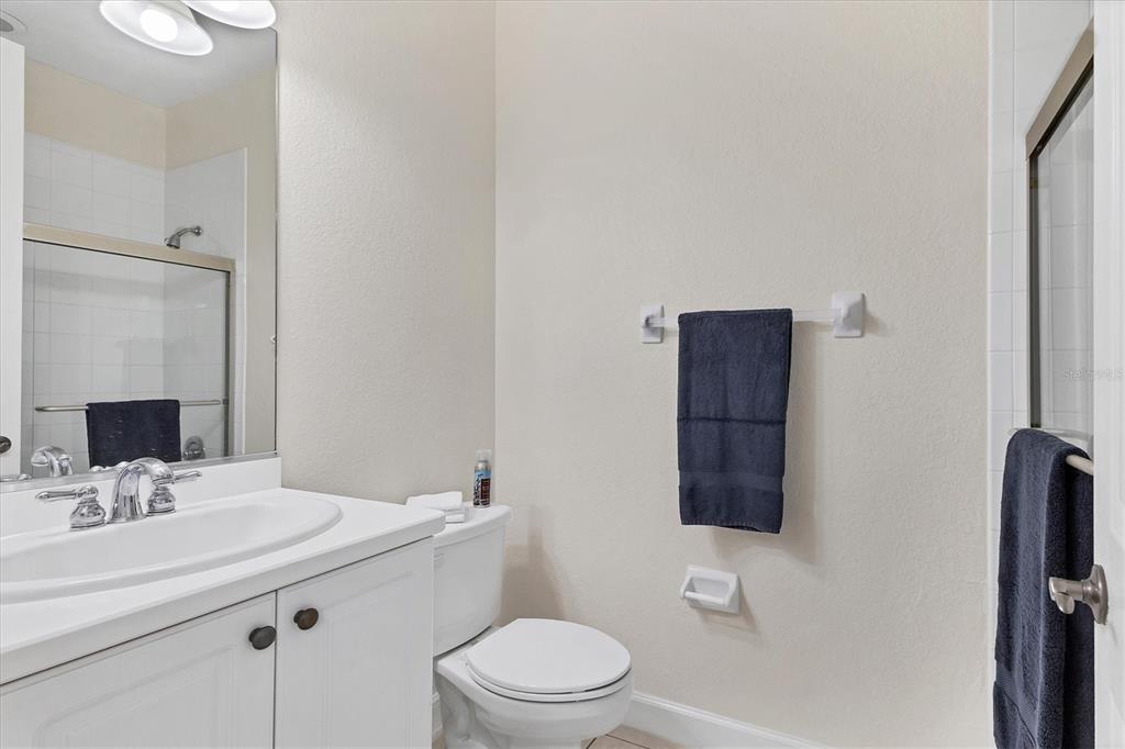 5425 46th Court West Bradenton, FL 34210 - Photo 21 of 39 a bathroom with a sink toilet and mirror