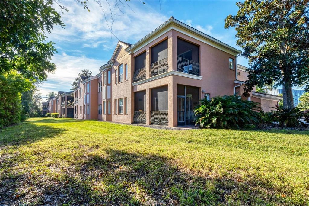 5425 46th Court West Bradenton, FL 34210 - Photo 24 of 39 a view of a house with a yard