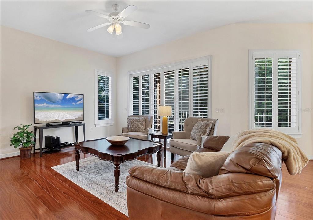 5425 46th Court West Bradenton, FL 34210 - Photo 3 of 39 a living room with furniture and a large window