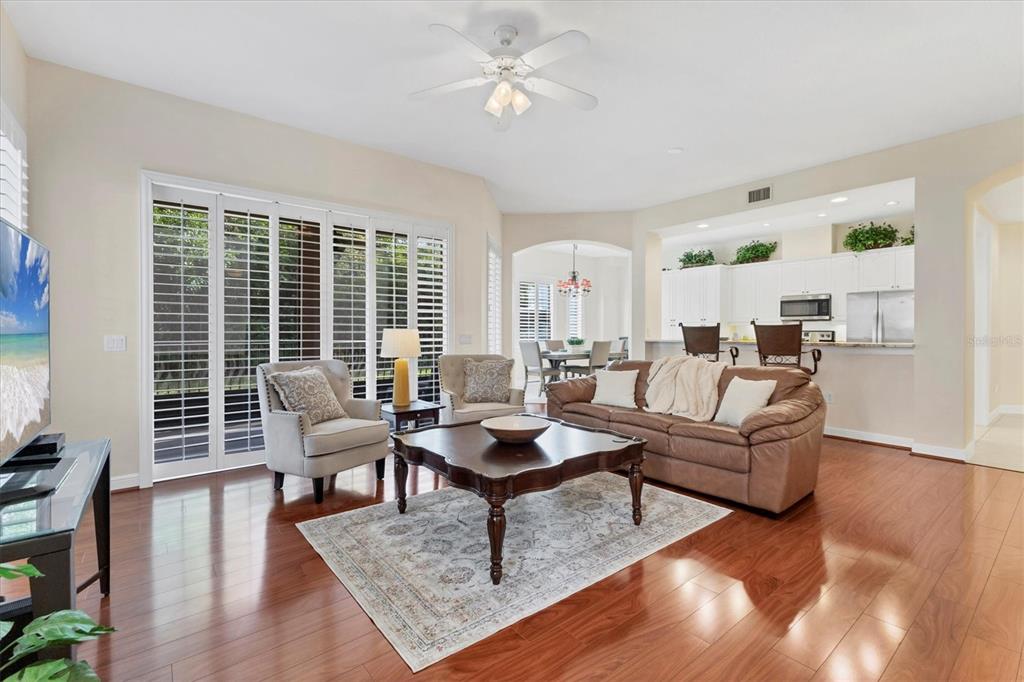 5425 46th Court West Bradenton, FL 34210 - Photo 4 of 39 a living room with furniture and a large window