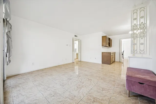 a view of livingroom with furniture and window