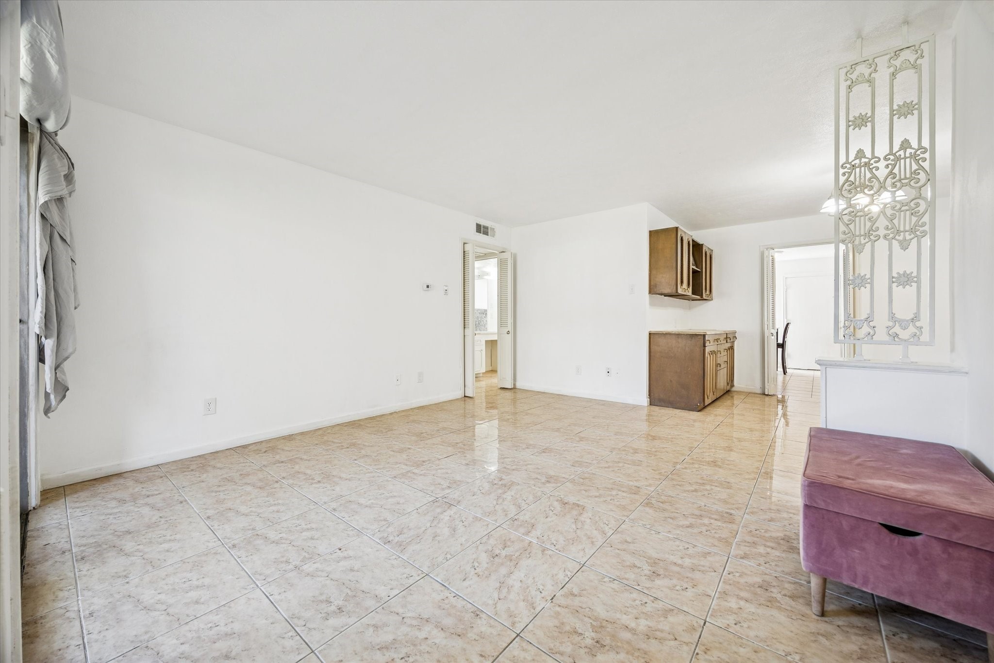 7600 Burgoyne Road, Unit 143 Houston, TX 77063 - Photo 2 of 17 a view of livingroom with furniture and window
