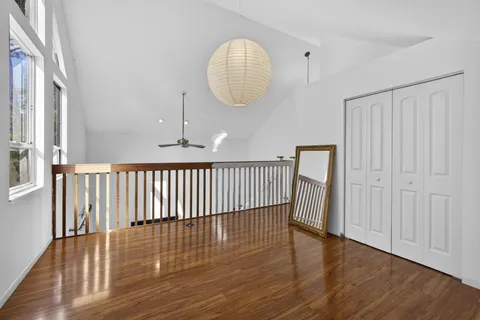 a bathroom with a toilet a sink and a mirror