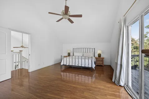 a view of backyard with swimming pool and sitting area