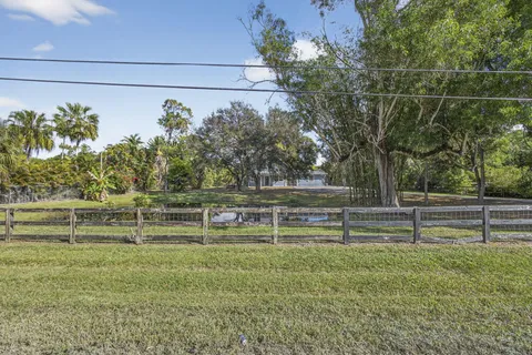 a view of a golf course with a lake
