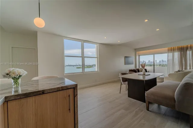 a living room with furniture and a table