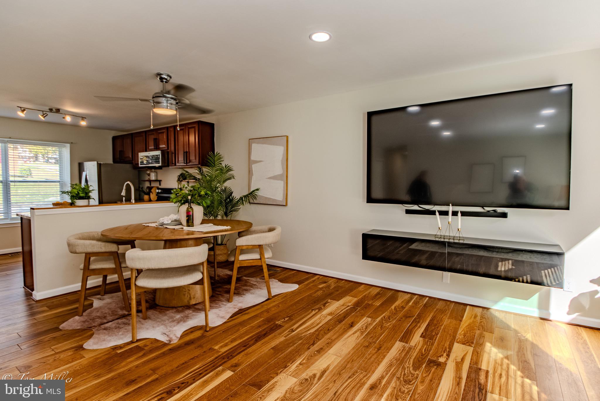 9544 Gunhill Circle Nottingham, MD 21236 - Photo 12 of 56 a living room with furniture and a flat screen tv