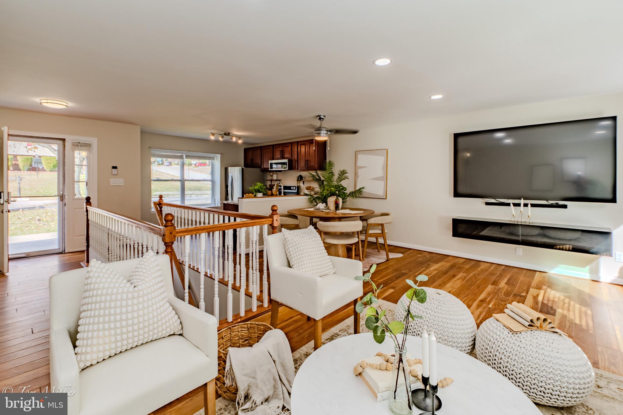 9544 Gunhill Circle Nottingham, MD 21236 - Photo 13 of 56 a living room with furniture and a flat screen tv