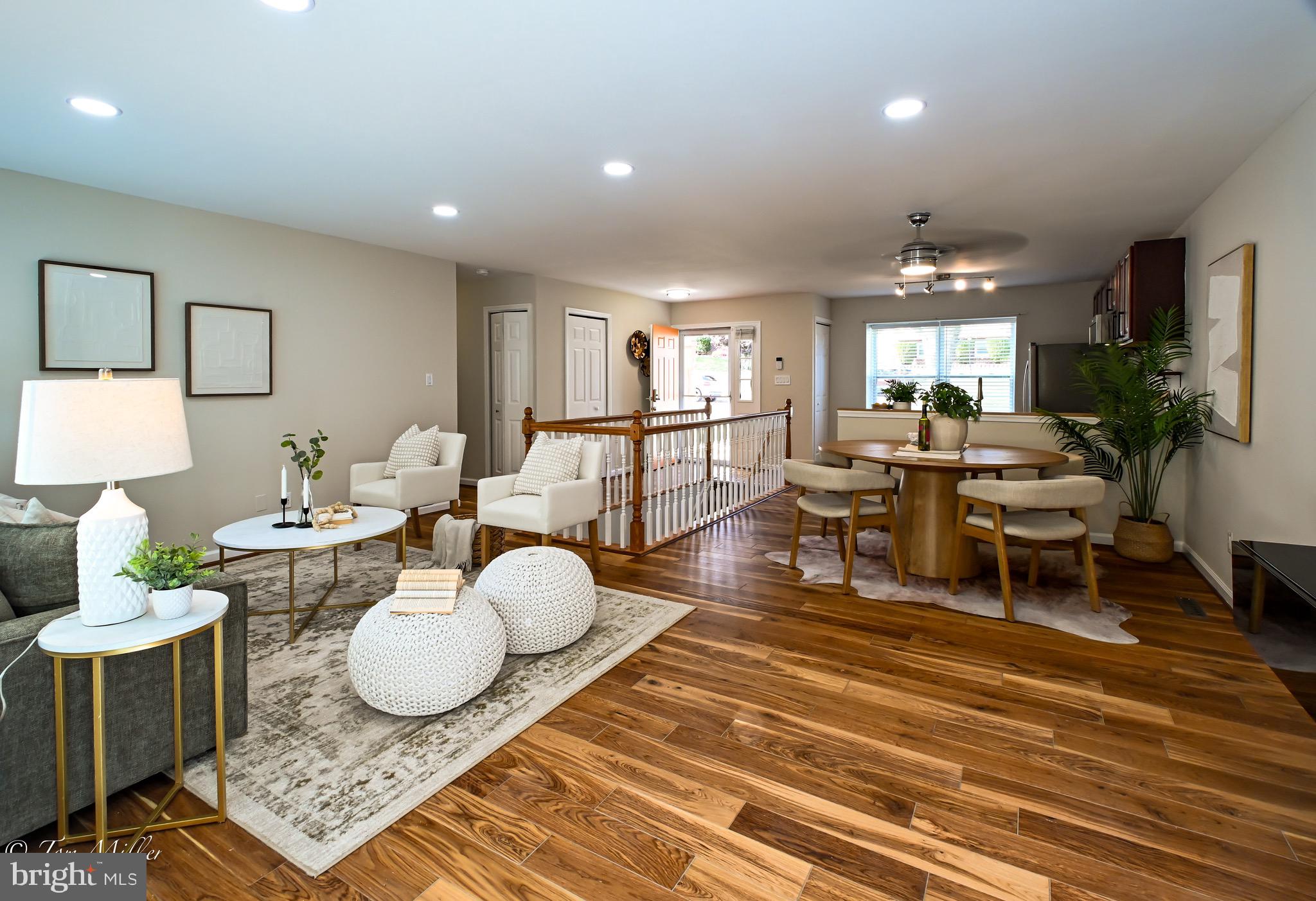 9544 Gunhill Circle Nottingham, MD 21236 - Photo 14 of 56 a living room with furniture a rug and a table