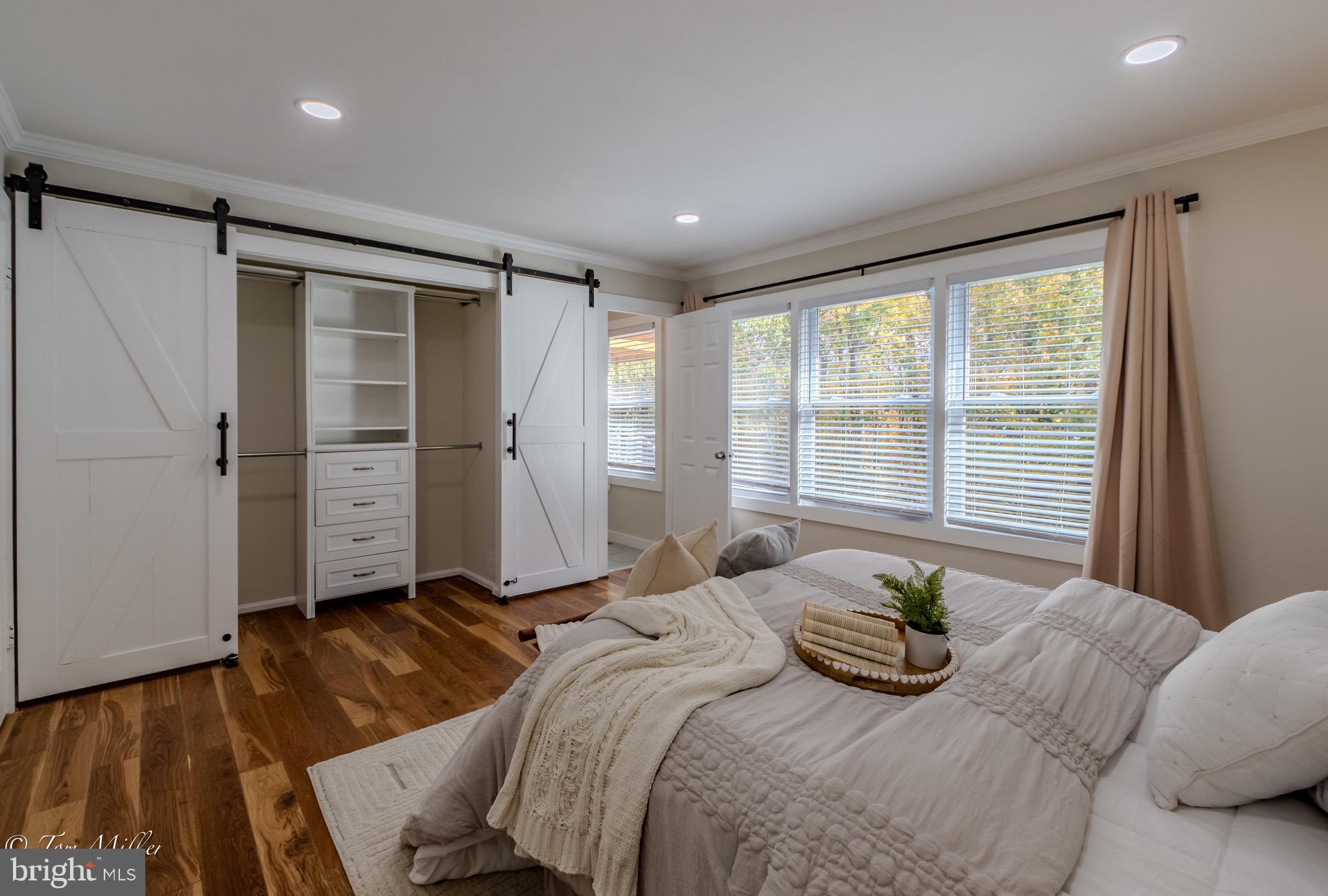 9544 Gunhill Circle Nottingham, MD 21236 - Photo 20 of 56 a bedroom with a bed and wooden floor