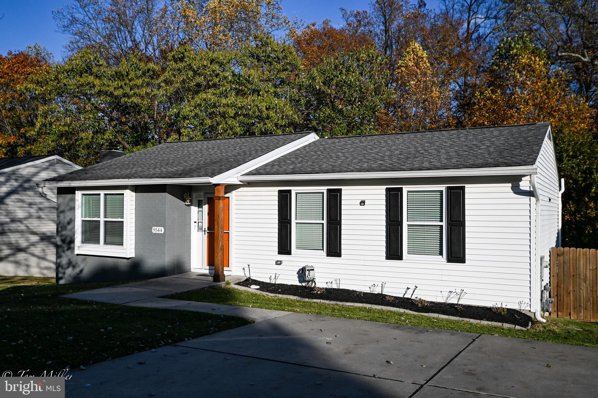 9544 Gunhill Circle Nottingham, MD 21236 - Photo 2 of 56 a front view of a house with a yard