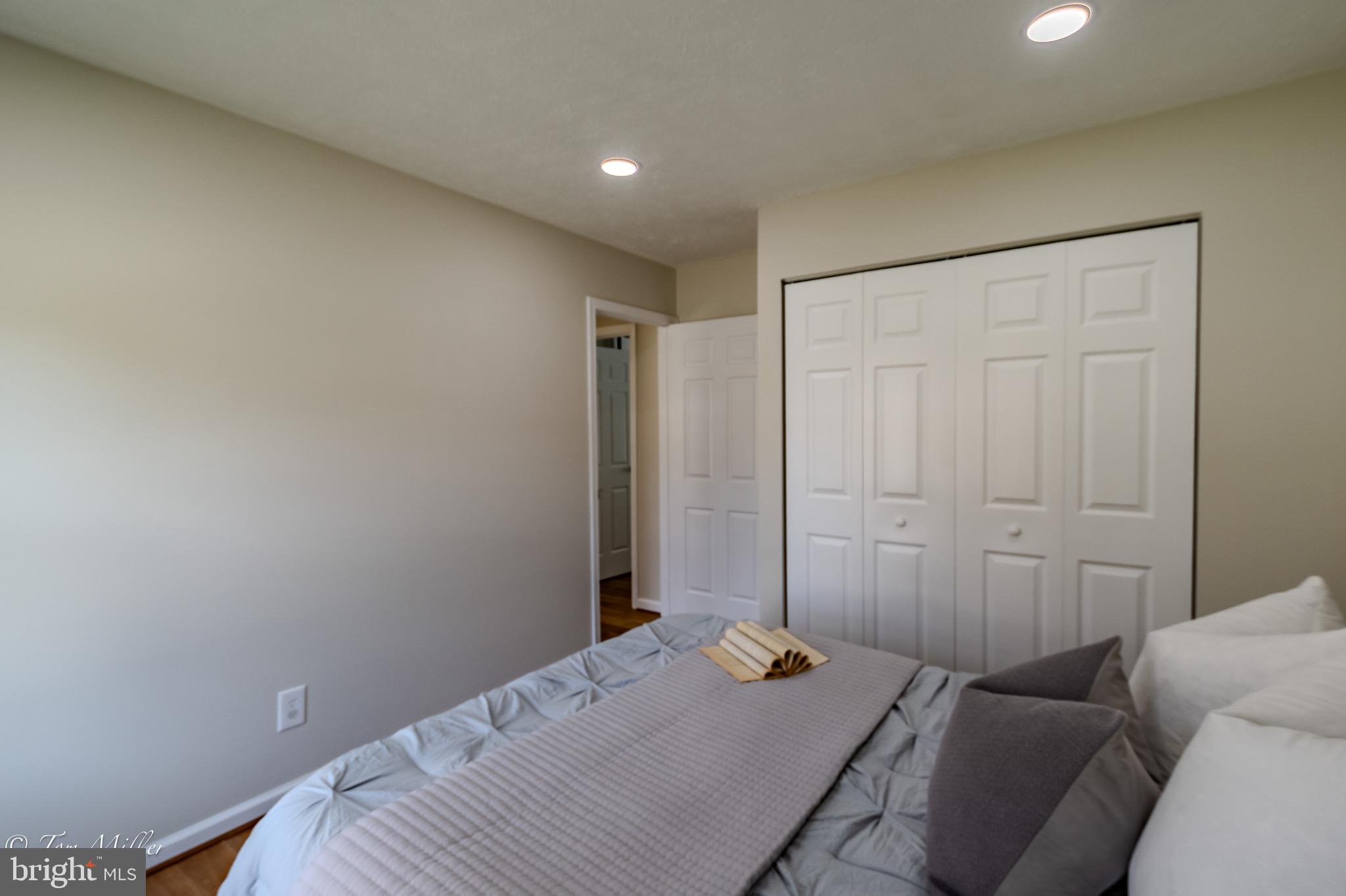 9544 Gunhill Circle Nottingham, MD 21236 - Photo 27 of 56 a bedroom with a bed and a closet