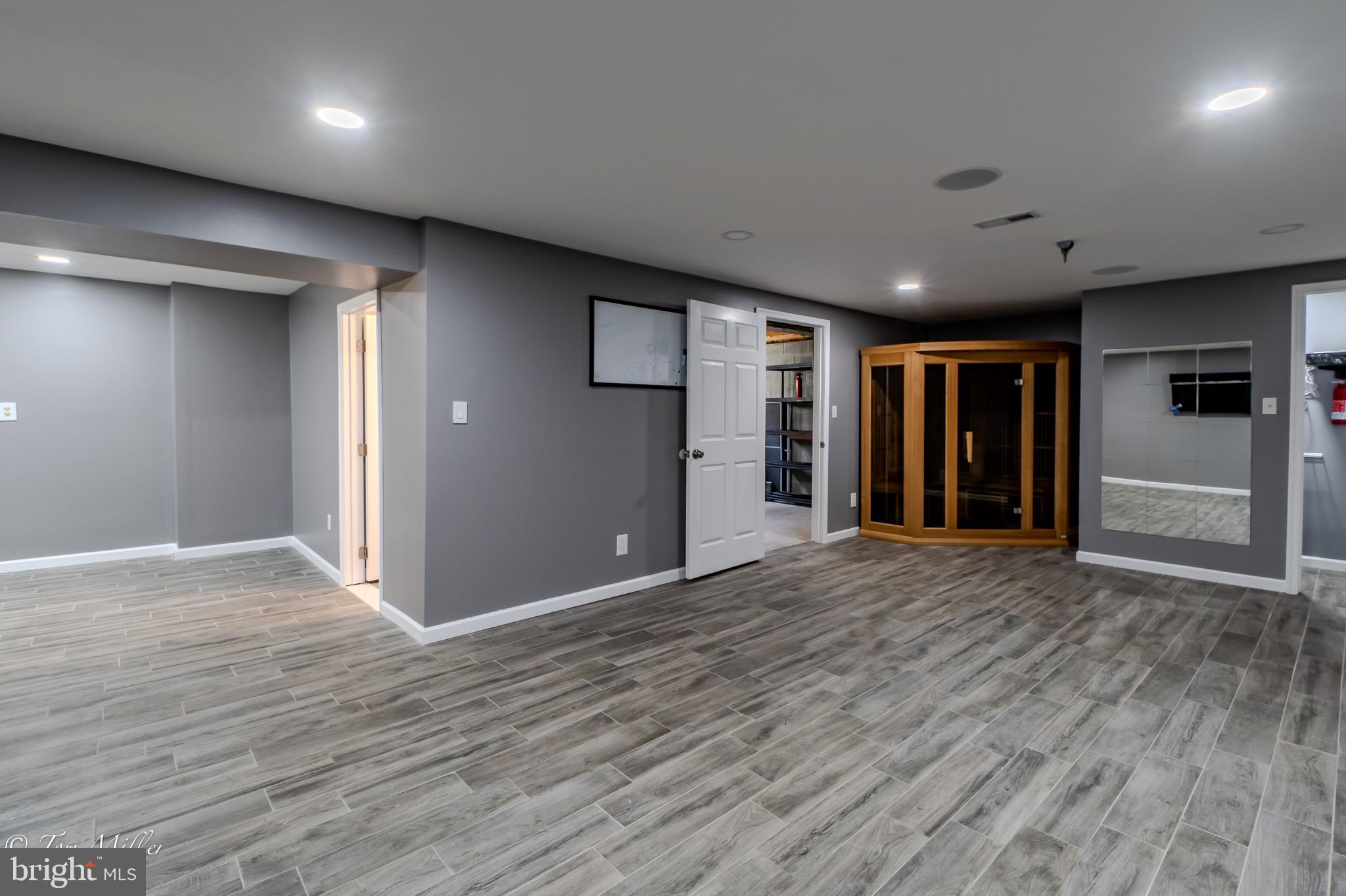 9544 Gunhill Circle Nottingham, MD 21236 - Photo 40 of 56 an empty room with closet and wooden floor