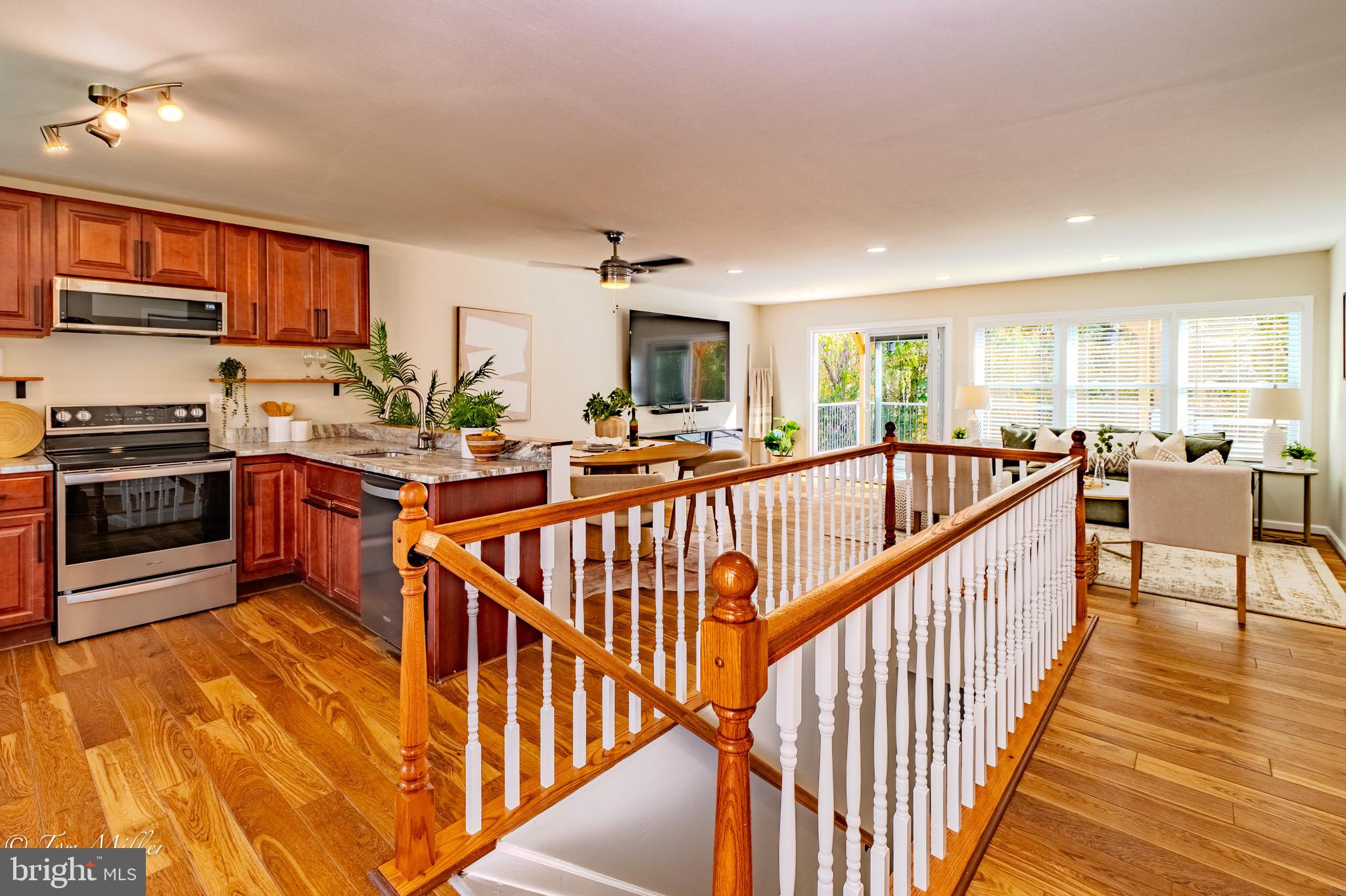 9544 Gunhill Circle Nottingham, MD 21236 - Photo 5 of 56 a view of a kitchen with stainless steel appliances granite countertop a stove a sink a refrigerator and cabinets