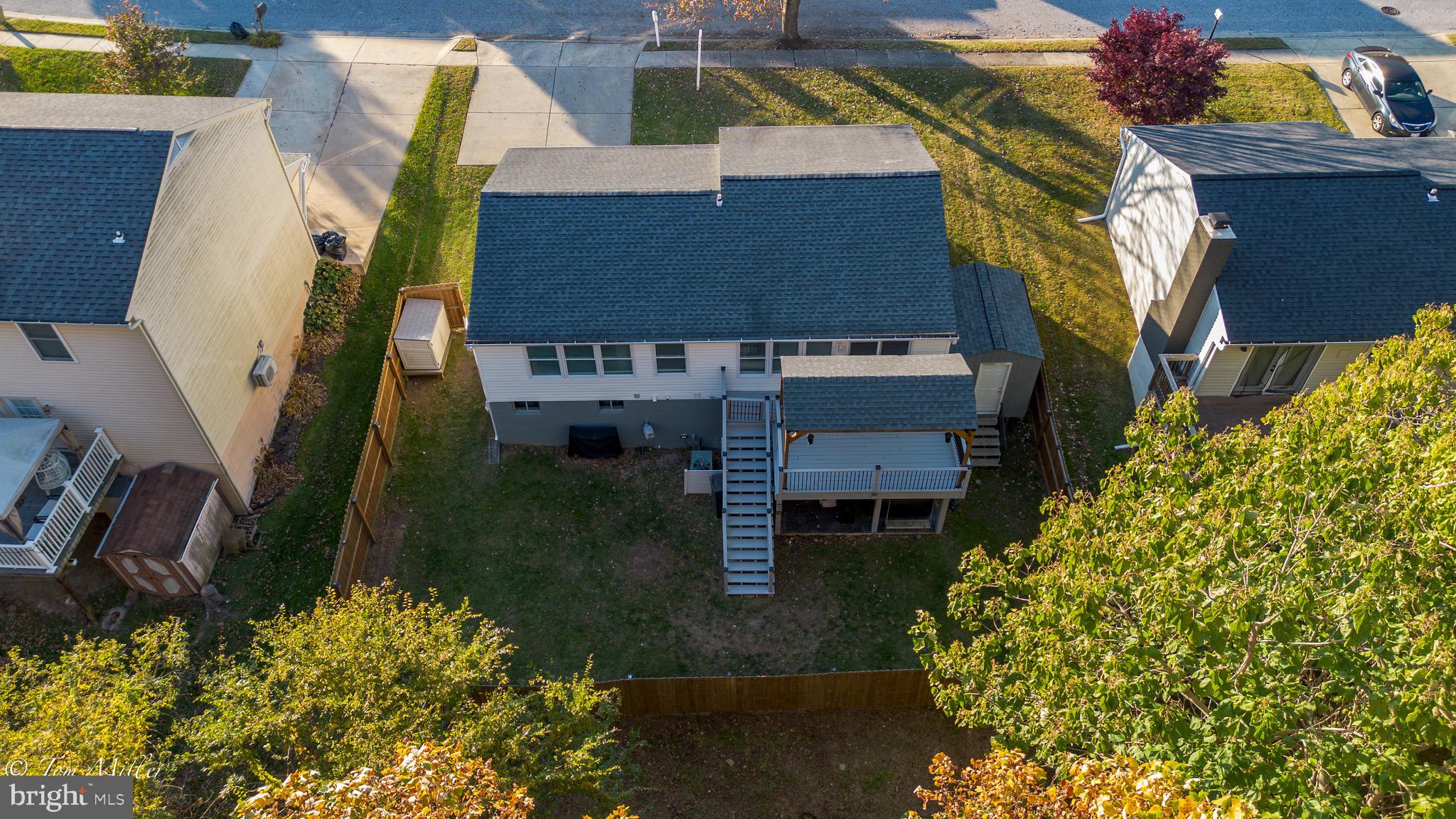 9544 Gunhill Circle Nottingham, MD 21236 - Photo 52 of 56 a view of a house with a yard