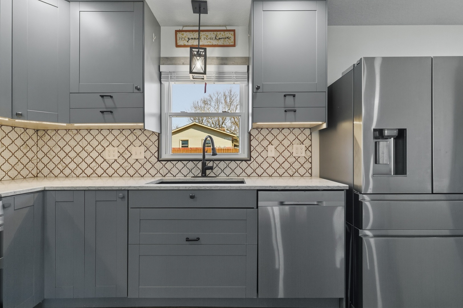 11622 27th Street West Milan, IL 61264 - Photo 9 of 49 a kitchen with cabinets and stainless steel appliances