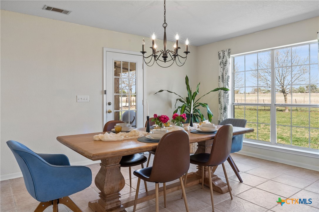 3000 West Amity Road Belton, TX 76513 - Photo 18 of 45 a view of a dining room with furniture window and outside view