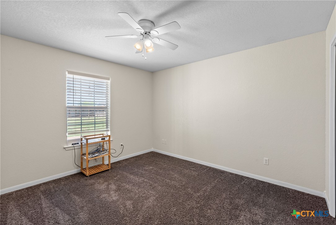 3000 West Amity Road Belton, TX 76513 - Photo 23 of 45 an empty room with windows