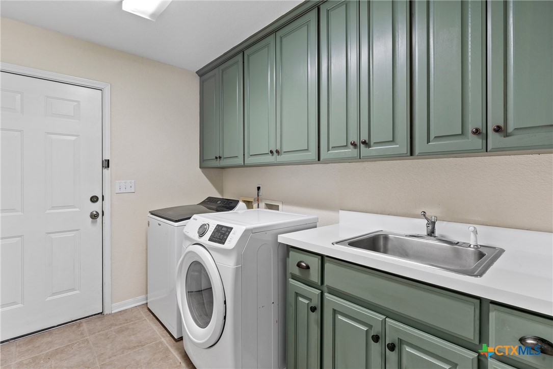 3000 West Amity Road Belton, TX 76513 - Photo 30 of 45 a utility room with dryer and washer