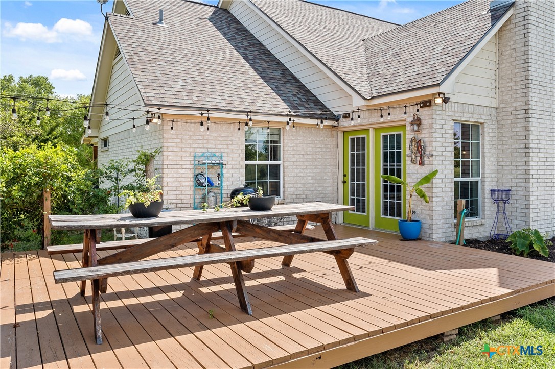 3000 West Amity Road Belton, TX 76513 - Photo 35 of 45 a view of a roof deck with wooden floor and furniture