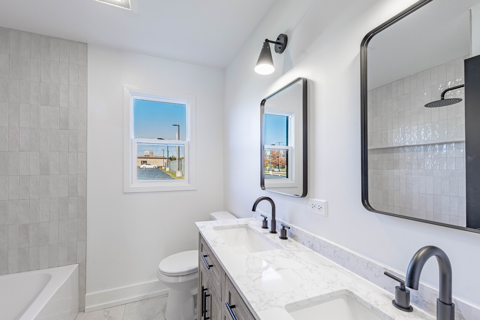 2N281 Bloomingdale Road Glendale Heights, IL 60139 - Photo 12 of 22 a bathroom with a sink and a toilet