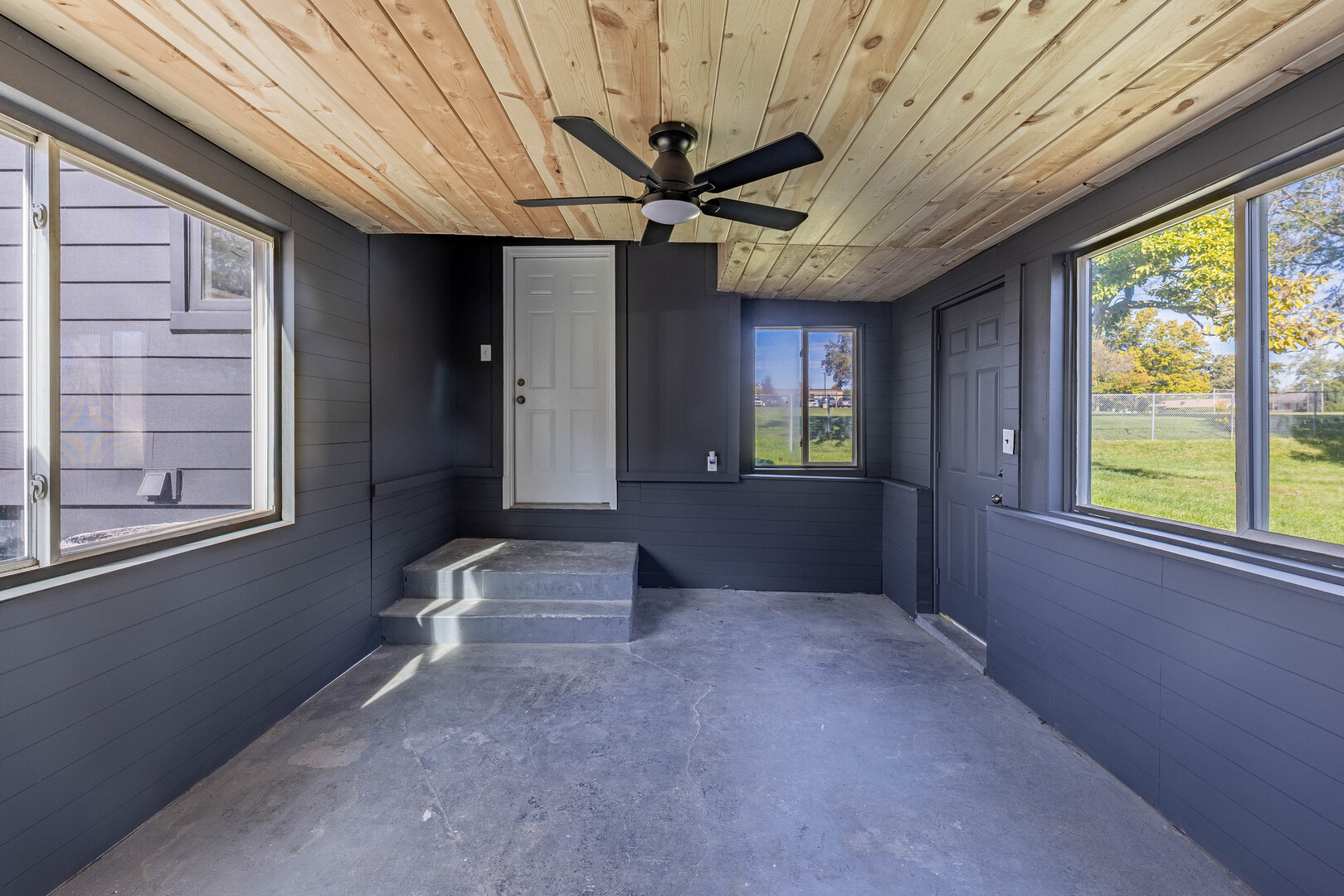 2N281 Bloomingdale Road Glendale Heights, IL 60139 - Photo 17 of 22 a view of livingroom with a ceiling fan and window