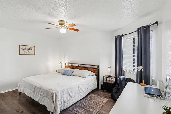 a view of a swimming pool with an outdoor seating