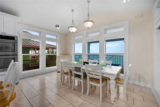 an aerial view of a house with a lake view